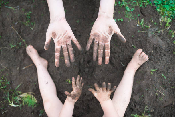 istock Parent and child playing in the ground 938379442