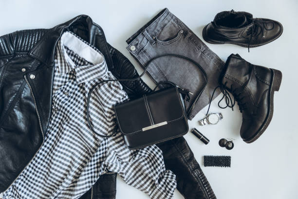 istock woman clothes flat lay. overhead view. black white concept 938380172