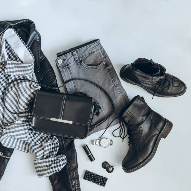 istock woman clothes flat lay. overhead view. black white concept 938380216