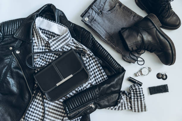 istock woman clothes flat lay. overhead view. black white concept 938382298