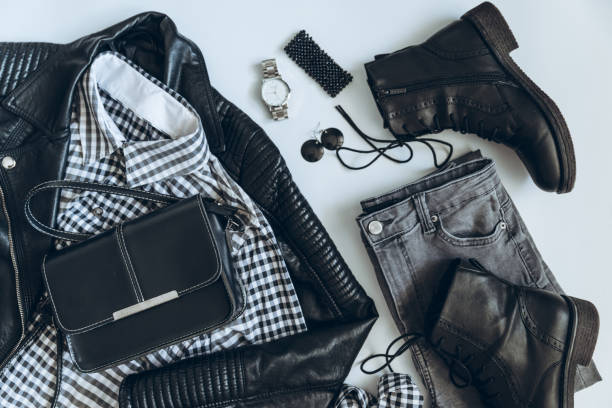 istock woman clothes flat lay. overhead view. black white concept 938382352