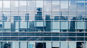 istock Glass windows from an office building 938382354