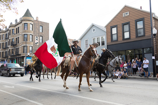 Chicago, Illinois, USA - September 16, 2017 - The Pilsen Mexican Independence Day Parade commemorates the Mexican Independence It features traditional folkloric, equestrian and Aztec dancing.
