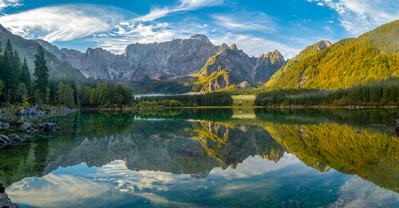 Panorama of a mountain lake in the Julian Alps in Italy - Laghi di fusine