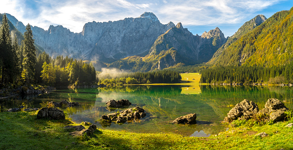 Panorama of a mountain lake in the Julian Alps in Italy - Laghi di fusine
