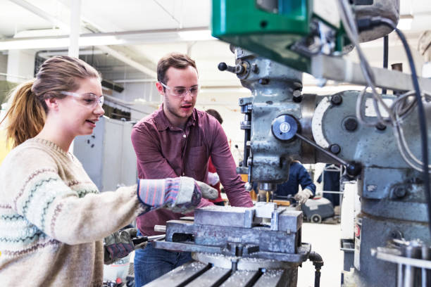 istock Pointing out where to move the machine 938394858