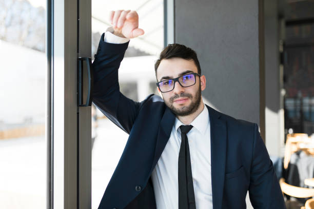 istock Single company executive standing by the window 938394866