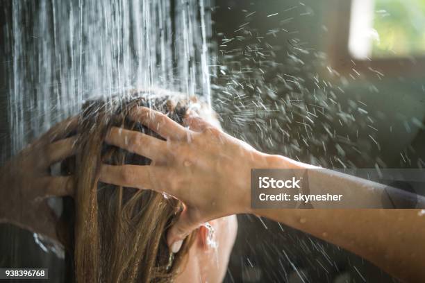 Close Up Of Unrecognizable Woman Washing Her Hair Under The Shower Stock Photo - Download Image Now