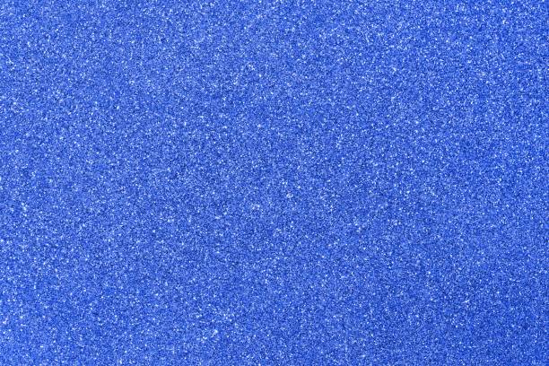 istock shimmering glittery background in Blue color 938401200