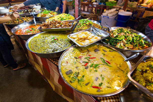 Thai street foods, Thai foods style Rice and Curry at market. stock photo