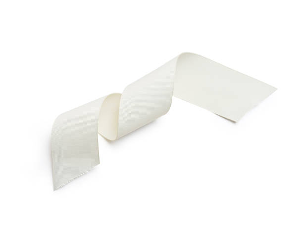 istock Vintage white ribbon isolated clipping mask on white background, top view 938413054