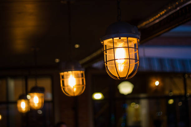 istock beautiful Retro style lighting decor bulb decor in restaurant 938418176