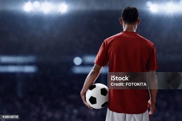 Soccer Player Holding Soccer Ball Stock Photo - Download Image Now - Soccer Player, Soccer, Rear View