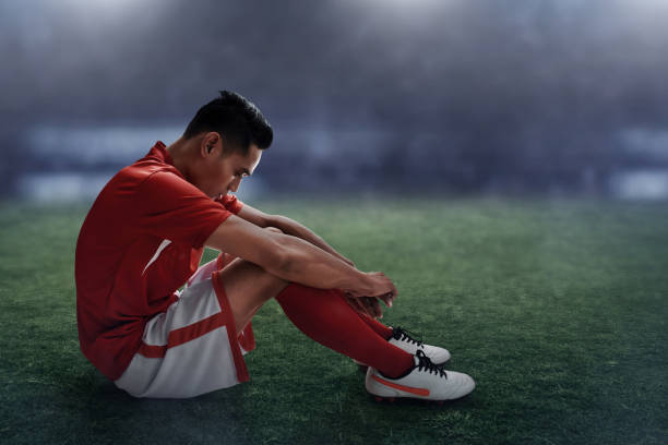futbolcu kaybetmek - indonesia football stok fotoğraflar ve resimler