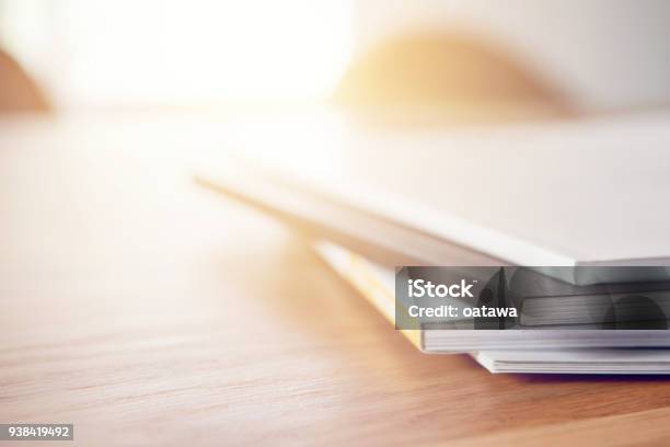 Close Up Stacking Magazine Place On Table Background Copy Space Stock Photo - Download Image Now