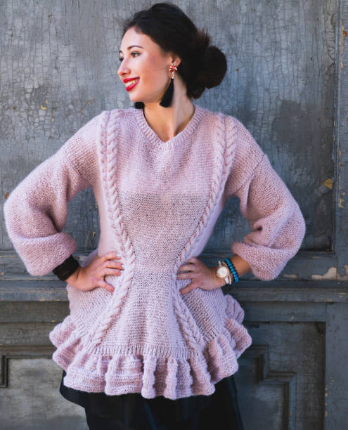 istock The beautiful woman in a lilac pullover 938422498