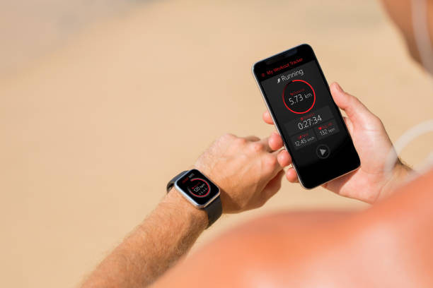 istock Man using wearable tech during fitness workout 938423496
