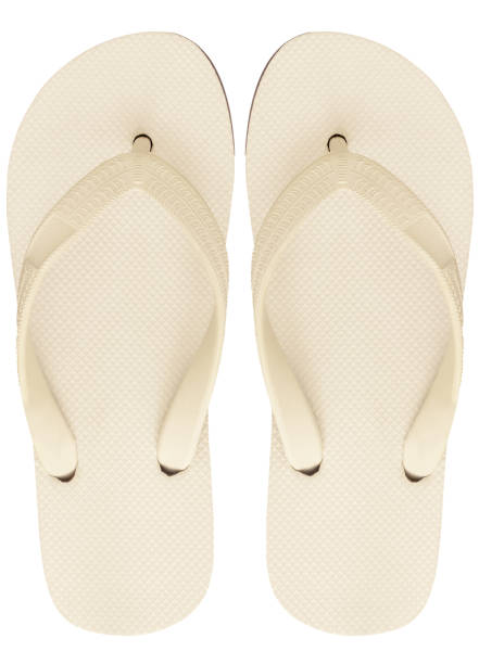 istock White sandals isolated on white background, top view. 938425970