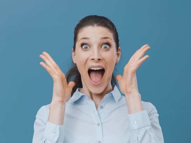 istock Surprised happy woman looking at camera 938431304