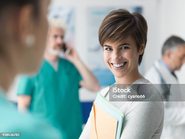 Patient At The Hospital Stock Photo - Download Image Now - Healthcare And Medicine, Medical Exam, Secretary