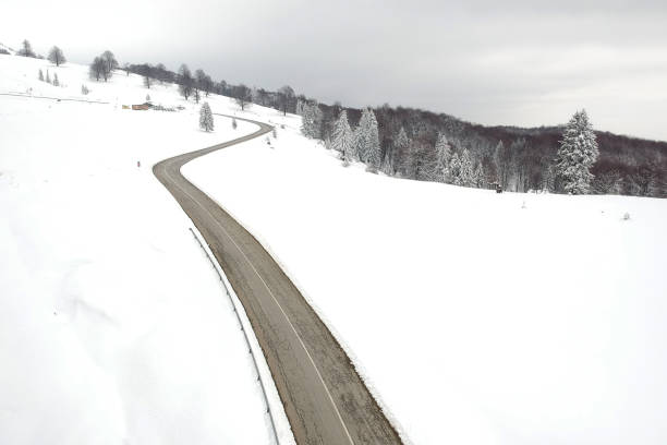 istock Aerial view above the mountain road 938442852