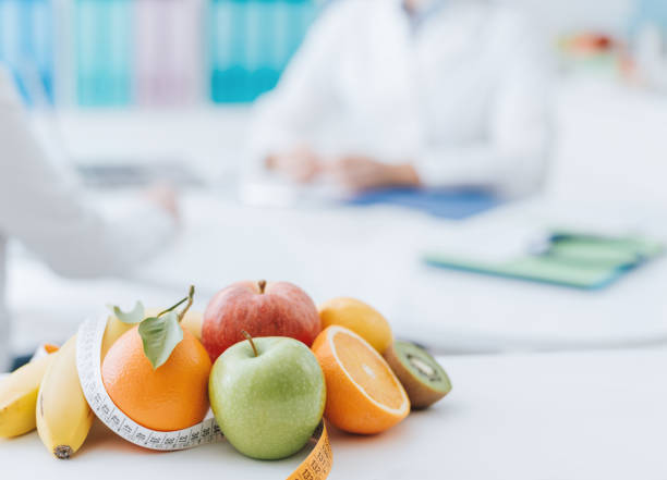 istock Nutritionist meeting a patient in the office 938443728