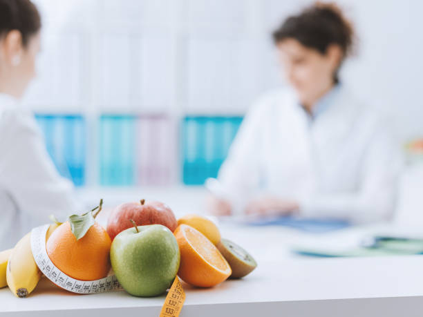 istock Nutritionist meeting a patient in the office 938444024