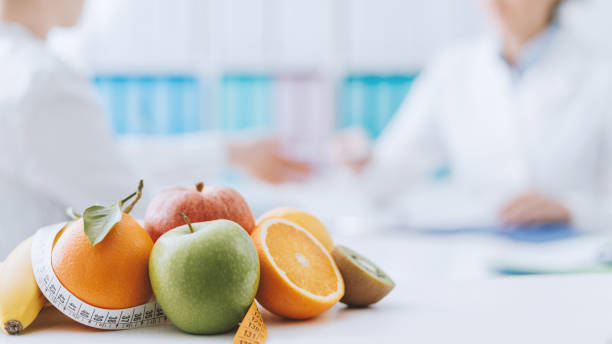 istock Nutritionist meeting a patient in the office 938444076