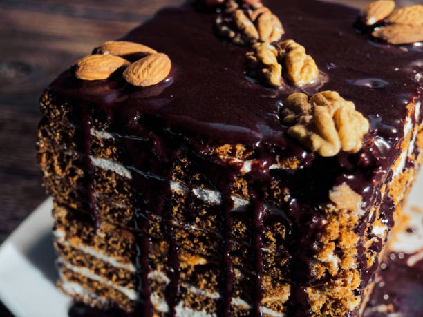 istock Homemade honey cake with chocolate coating 938446398