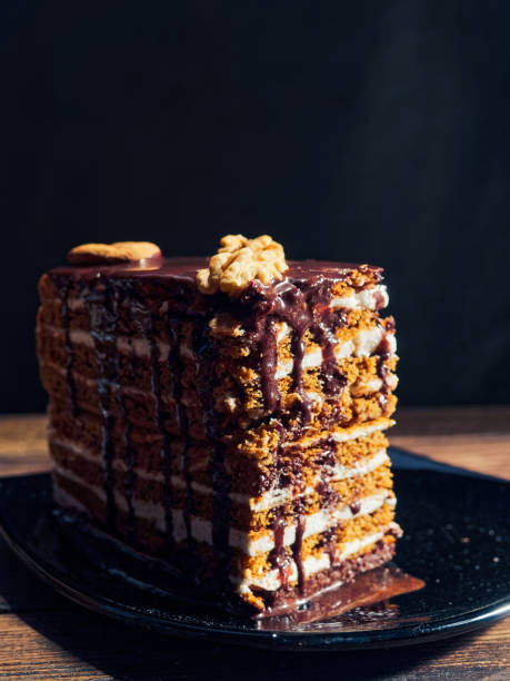 istock Homemade honey cake with chocolate coating 938446444