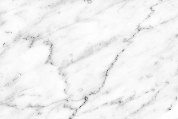 istock White Carrara Marble natural light surface for bathroom or kitchen countertop 938450346