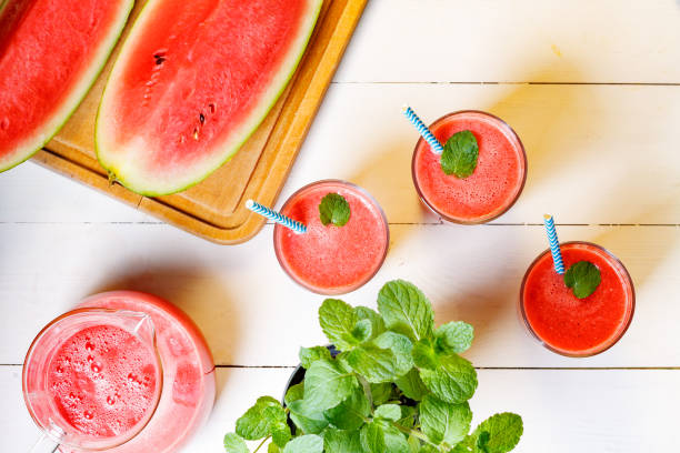istock Above view on glass with fresh watermelon smoothie. 938453370