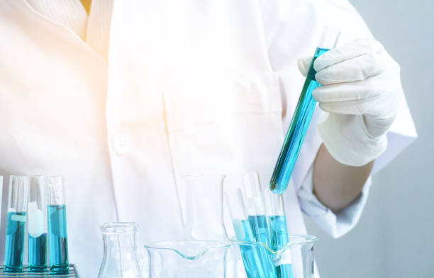 istock Test tubes closeup, science laboratory research and development concept 938454404