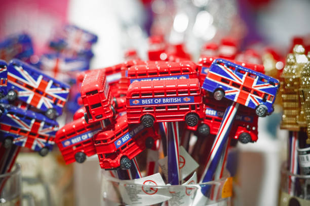 Selective focus, souvenir pencils decorated with double decker bus on display at Camden market Selective focus, souvenir pencils decorated with double decker bus on display at Camden market in London camden stables market stock pictures, royalty-free photos & images