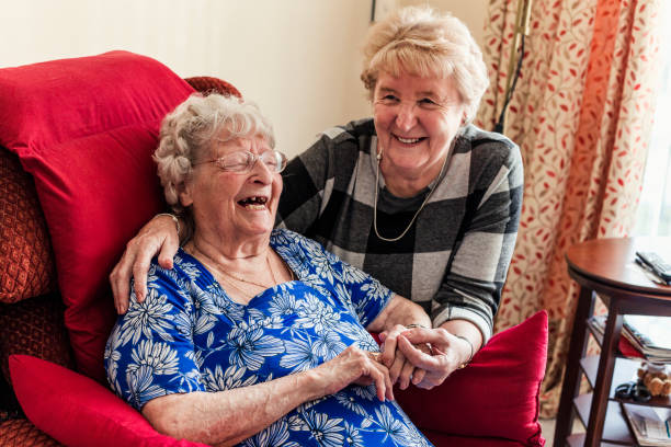 istock Senior Women Sharing a Joke 938456890