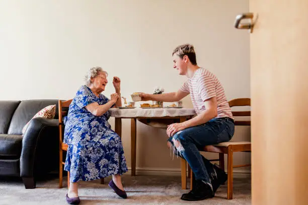 Photo of Visiting his Elderly Relative