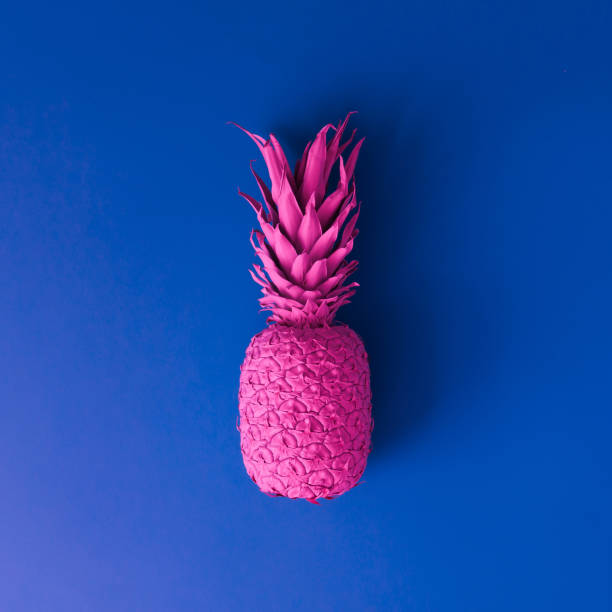 istock Pineapple in vibrant bold gradient holographic neon  colors. Concept art. Minimal surrealism background. 938464328
