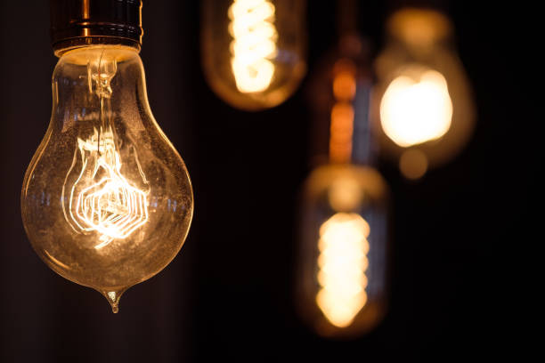 istock Incandescent spiral retro vintage warm lamp edison 938467254