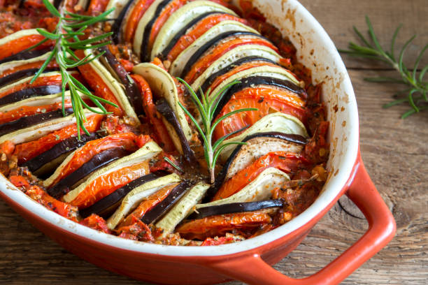 Ratatouille casserole Ratatouille - traditional French Provencal vegetable dish cooked in oven. Diet vegetarian vegan food - Ratatouille casserole. ratatouille stock pictures, royalty-free photos & images