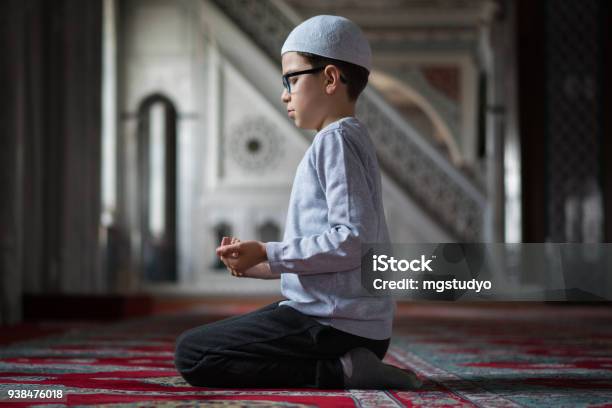 Muslim Boy Praying In Mosque Stock Photo - Download Image Now - Mosque,  Praying, Schoolboy - iStock