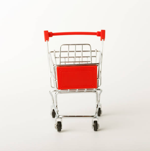 istock Empty shopping cart isolated on white background 938477010