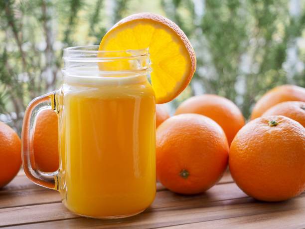 istock Orange juice and orange 938480316