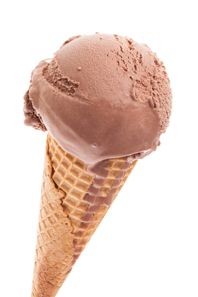 istock single scoop of chocolate ice cream in a fresh cone diagonal from above isolated on white background 938481036