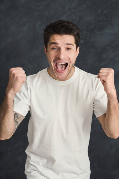 istock Excited man very glad to success 938481044