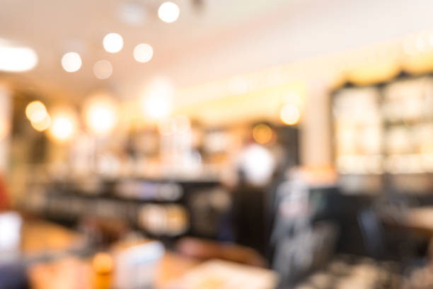 istock Blur coffee shop or cafe restaurant with abstract bokeh light image background 938483966