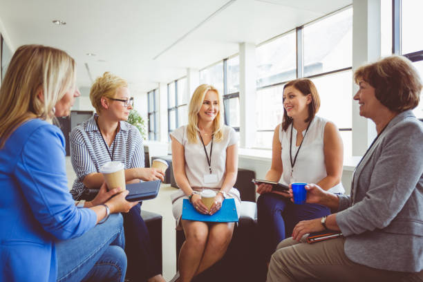 istock Group of women at the training, having coffee break 938487046