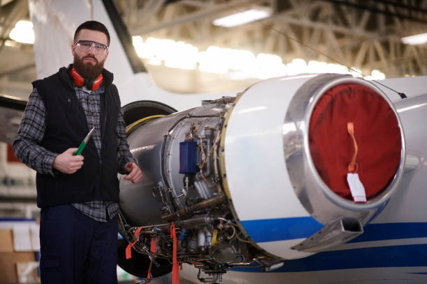 istock Aircraft mechanic in the hangar 938493308