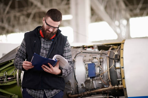 istock Aircraft mechanic in the hangar 938493426