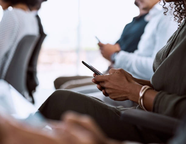 istock Submitting their questions wth their smartphones 938493880