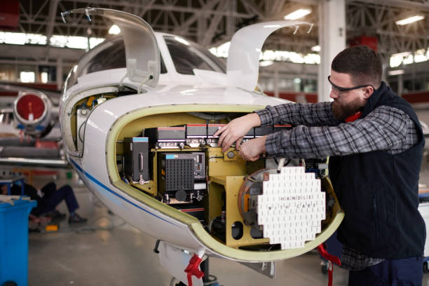 istock Aircraft mechanic in the hangar 938495348